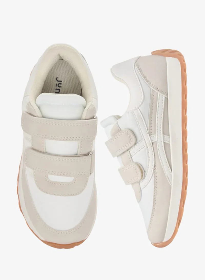 جونيورز سنيكرز أولاد بنعل مخطط بإغلاق لاصق